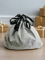 Sac cadeau chic avec nœuds noirs